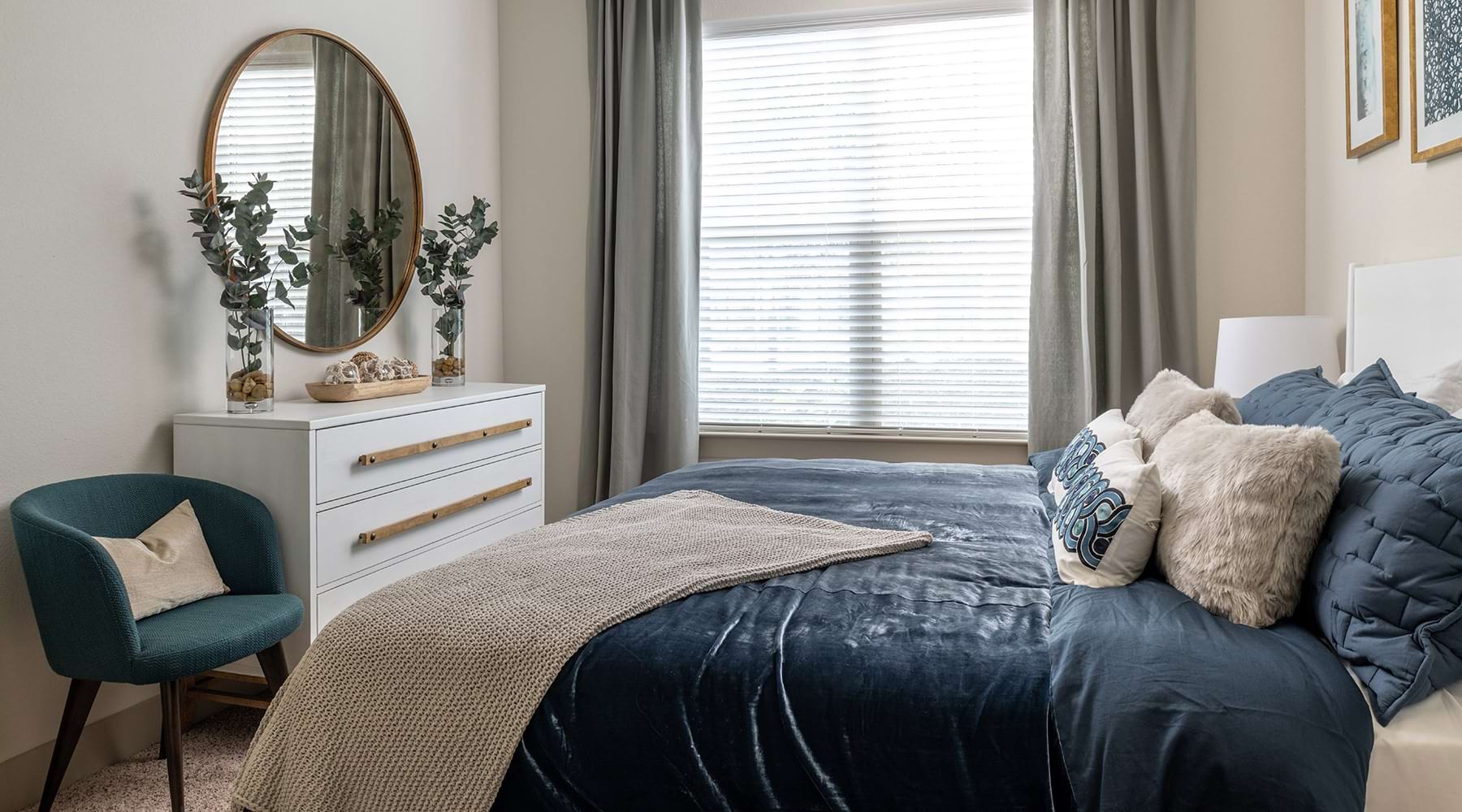Bedroom  Spacious and well lit bedroom with plush carpet and large windows